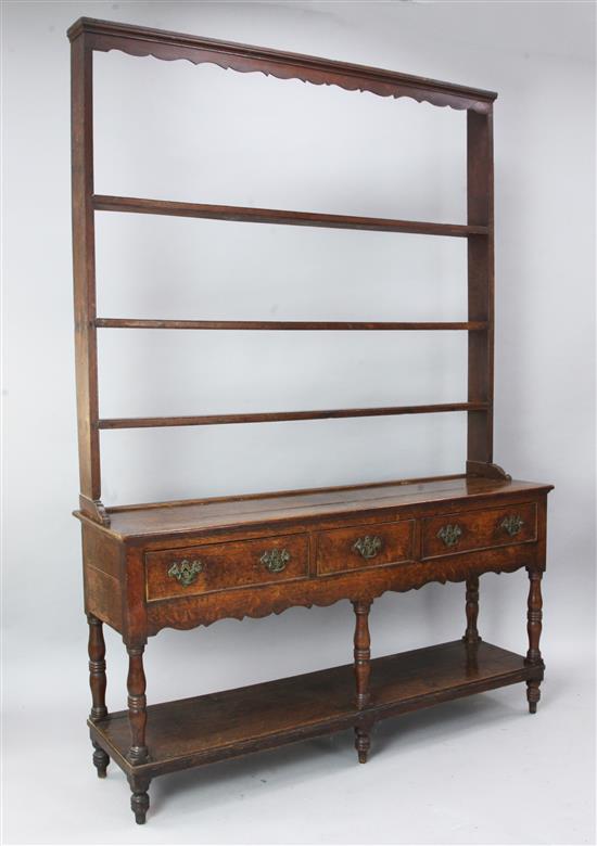 An early 19th century oak dresser, W.4ft 9in. D.1ft 4in. H.6ft 10in.